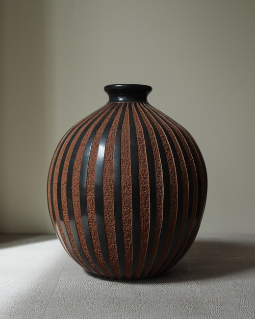 Amapola: handmade Nicaraguan ceramic round vessel with glossy black and textured terracotta vertical stripes