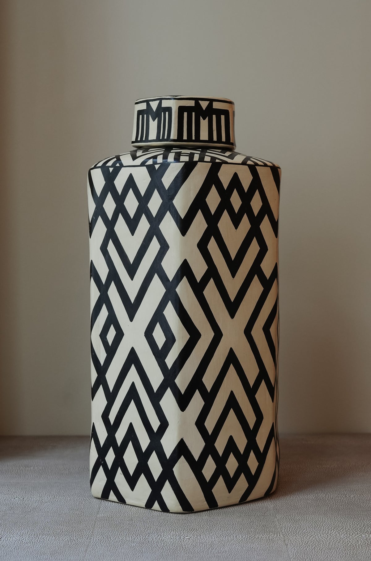 Ocoso: handmade Nicaraguan ceramic lidded jar with a black and white diamond pattern
